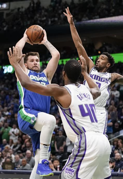 Mavs keep play-in hopes alive with 123-119 win over Kings